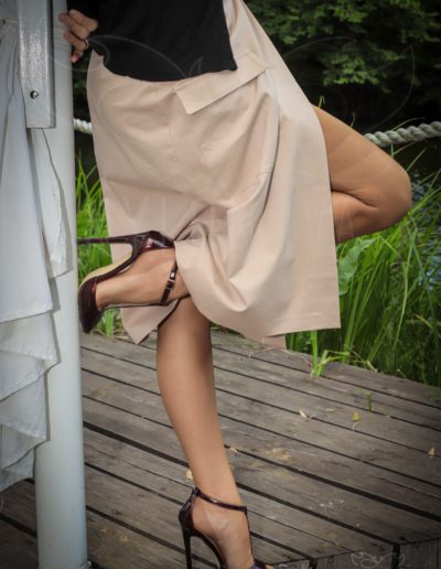Mrs NyloNova wearing open front na-kd skirt, old vintage nylon ff stockings and Only Maker high heeled sandals.