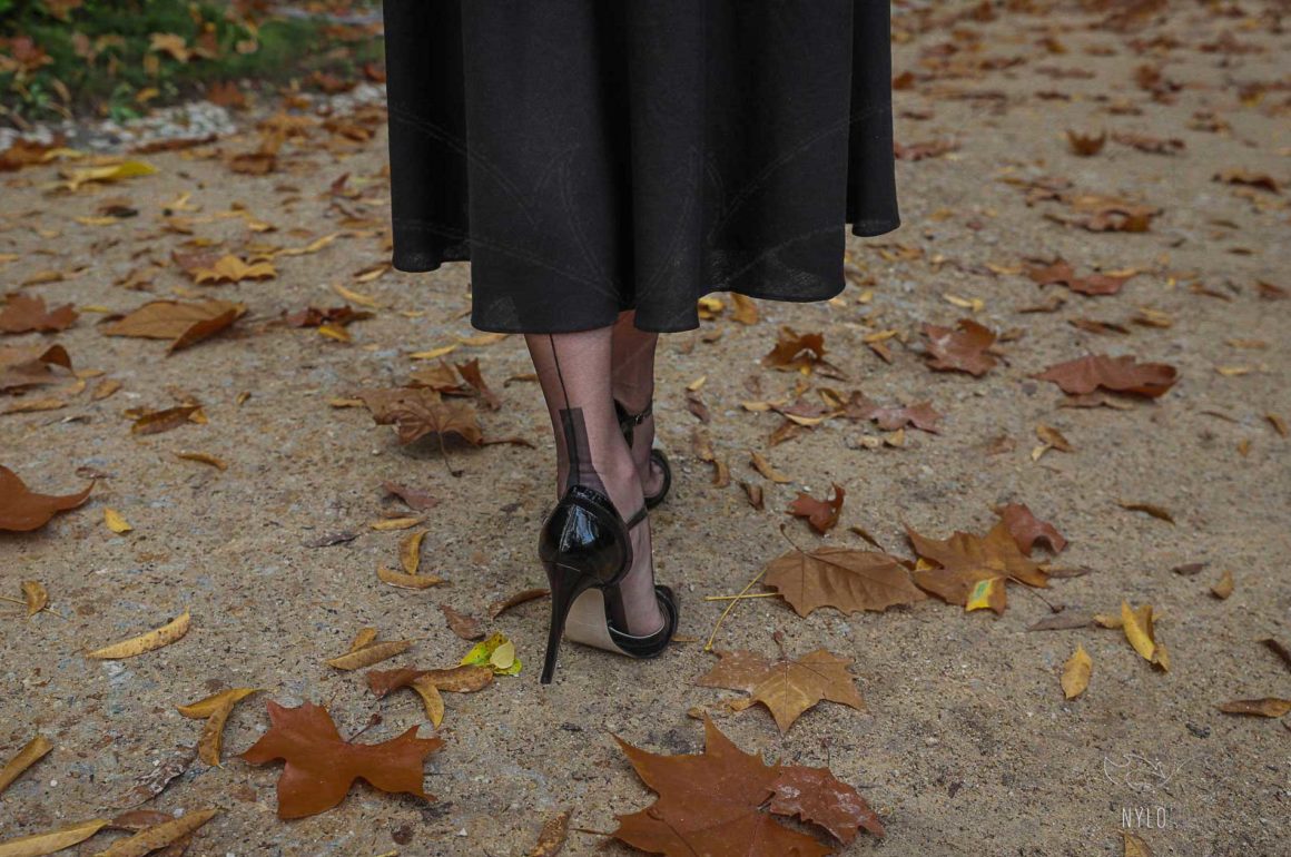 Mrs NyloNova wearing long black dress, Gino Rossi high heels and sheer black seamed Cervin nylon stockings.