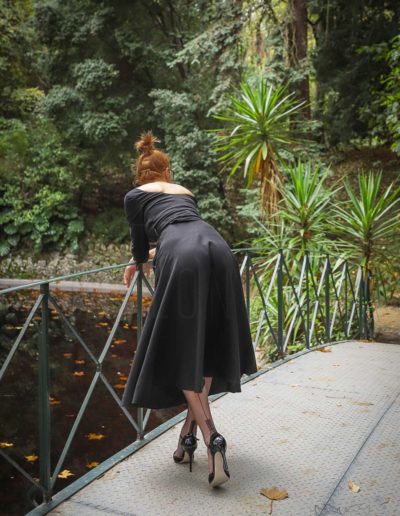 Mrs NyloNova wearing long black dress, Gino Rossi high heels and sheer black seamed Cervin nylon stockings.